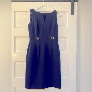 Tahari dress. Navy with gold buckle details at waist.
